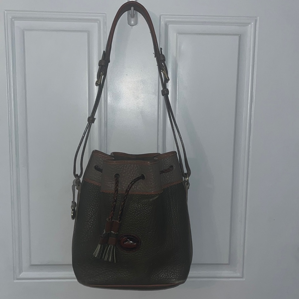 Rare vintage olive, Dooney and Bourke leather Teton bucket purse.